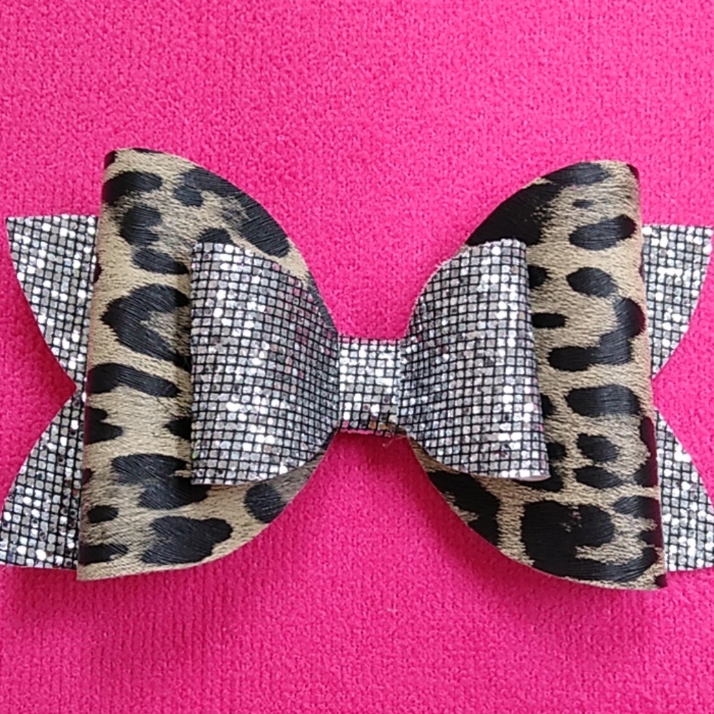 Handmade cheetah print faux leather hairbow